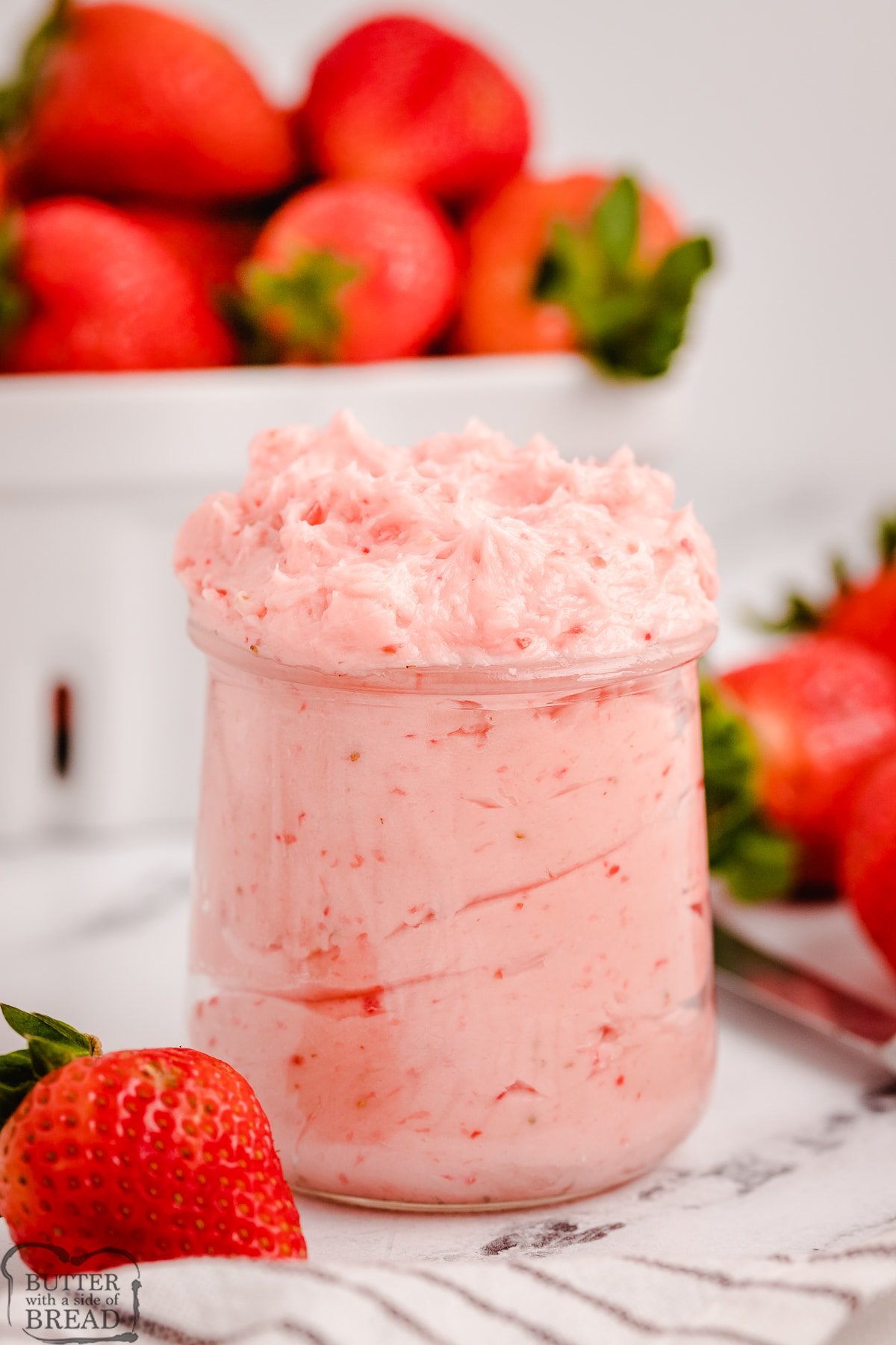 over the top jar full of strawberry butter