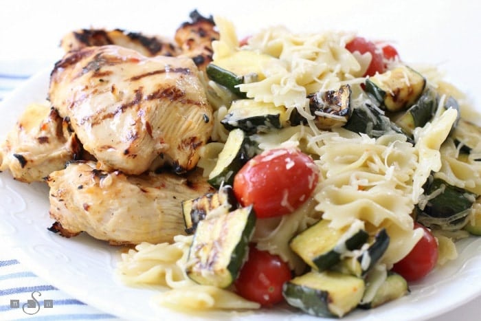 Grilled Italian Chicken is a simple & delicious summer dinner. Italian dressing adds fantastic flavor in the tender grilled chicken & vegetables.