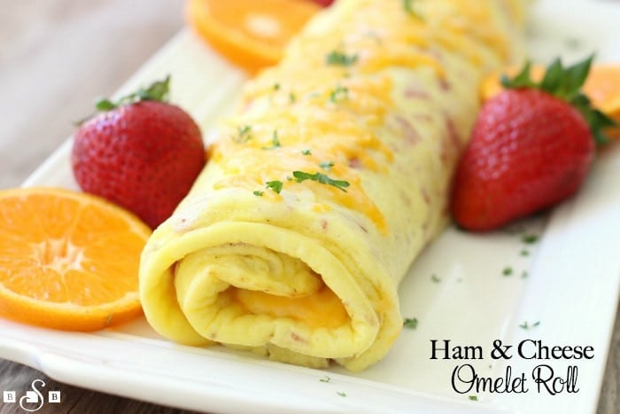 Ham & Cheese Omelet Roll...your new favorite breakfast! It takes the delicious egg, ham, and cheese flavor combination and gives it a lovely twist, while remaining simple to make.
