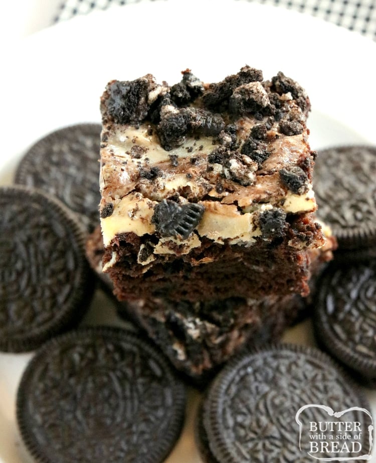 Cookies & Cream Brownies combine a rich, fudgy brownie recipe with a sweet cream cheese layer that is swirled on top! There are Oreo cookies in the brownies and also on top for more cookies and cream deliciousness!