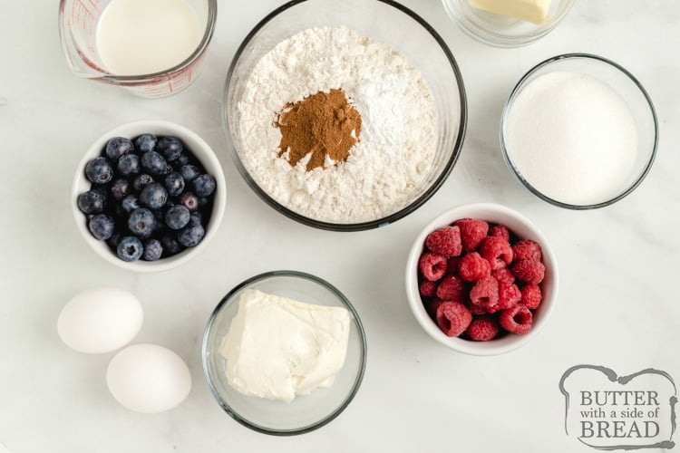Ingredients in berry muffins with cheesecake filling