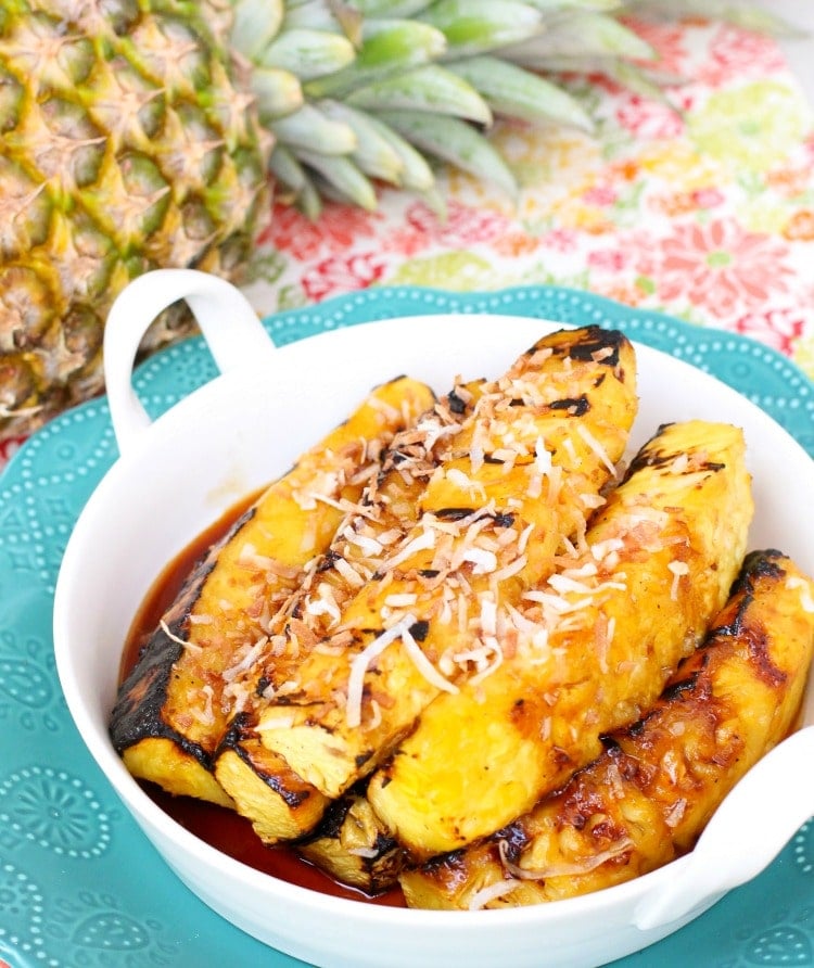 Grilled Pineapple with Coconut glaze is a fantastic side dish or dessert! Made easy with coconut, brown sugar and fresh pineapple, this is the best grilled pineapple I've tasted!