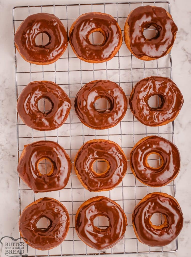 cooling rack with chocolate covered donuts