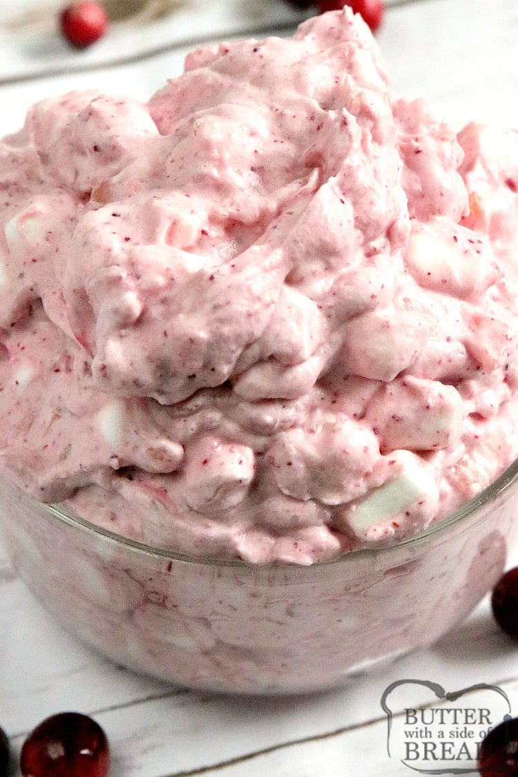 Creamy Cranberry Salad is made in minutes with only five ingredients! This cranberry salad recipe is made with fresh cranberries, crushed pineapple, whipping cream and marshmallows.