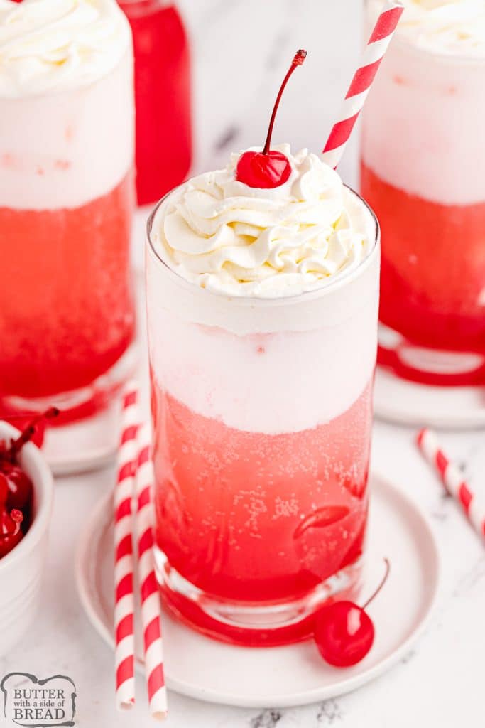 cherry cream sodas with a red straw
