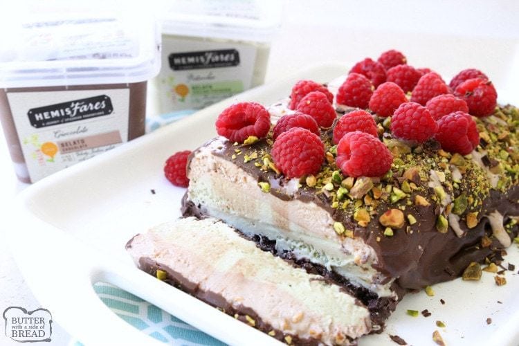Gorgeous Gelato Torte recipe with sophisticated flavors. Three layers of rich, creamy gelato topped with chocolate ganache, pistachios & fresh raspberries.