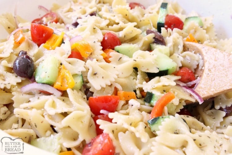 Greek Pasta Salad is fresh, flavorful and simple to put together. It's the perfect side dish! Loaded with vegetables and drizzled with a homemade lemon greek vinaigrette, it's easy to make and everyone enjoys it. Perfect topped with crumbled feta cheese and a few additional olives.