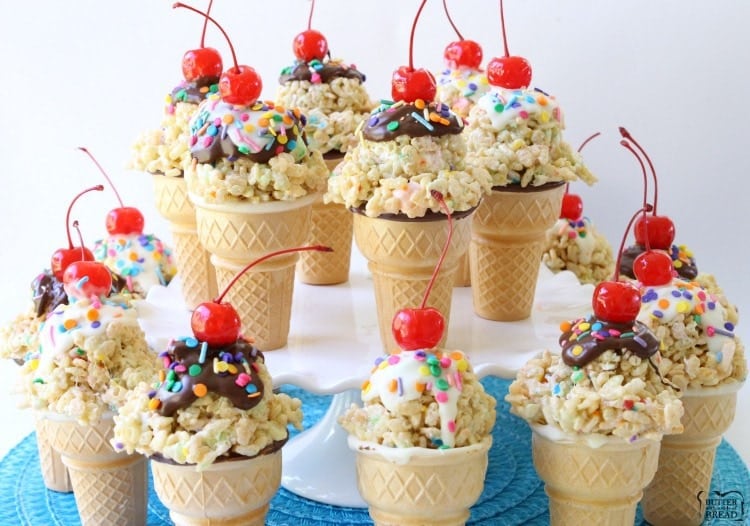 Rice Krispie Ice Cream Cones are easy to make & super cute too! Gooey marshmallow treats topped with melted chocolate, sprinkles & a cherry make these cute cones amazing. Bonus too- they each have a special treat inside the cone! 