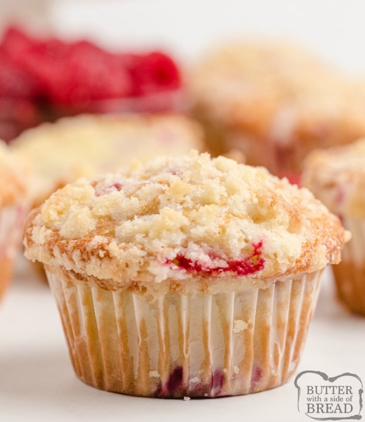 Lemon Raspberry Muffins with a light lemon flavor, filled with fresh raspberries and then topped with a sweet buttery streusel topping. These muffins are perfect for breakfast or a sweet snack any time of the day!
