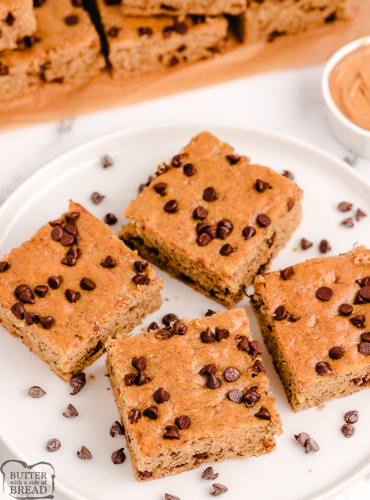 plate of chocolate chip banana bars with peanut butter