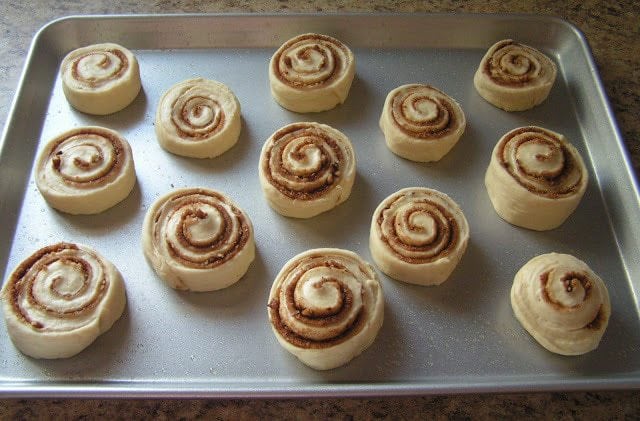 Cinnamon Rolls made from scratch that yields feather-light sweet rolls with pecans, cinnamon and a lovely vanilla glaze. Best cinnamon roll recipe ever tried! 