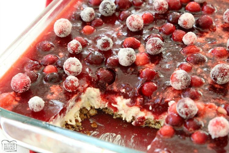 Cranberry Jello Salad made with 3 festive, delicious layers of pretzels, pudding, cranberries & Jello! Impressive, easy addition to your holiday meal.