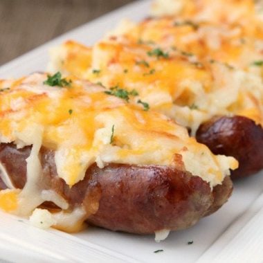Sausage Potato Boats are an easy weeknight dinner made with juicy sausages topped with buttery mashed potatoes and lots of cheese! Simple & flavorful meal!