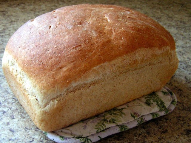 Homemade Bread made with simple ingredients you can find anywhere! Bake a loaf of easy, fresh, homemade bread to serve alongside dinner tonight.