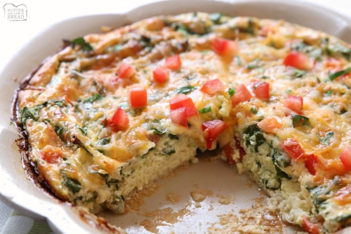 Crustless Spinach Quiche recipe that's quick & easy and tastes absolutely delicious! Packed with protein from milk, cheese and eggs, this easy quiche recipe also has spinach and fresh tomatoes. Serving crustless quiche makes prep so much easier, plus the quiche is healthier for you.