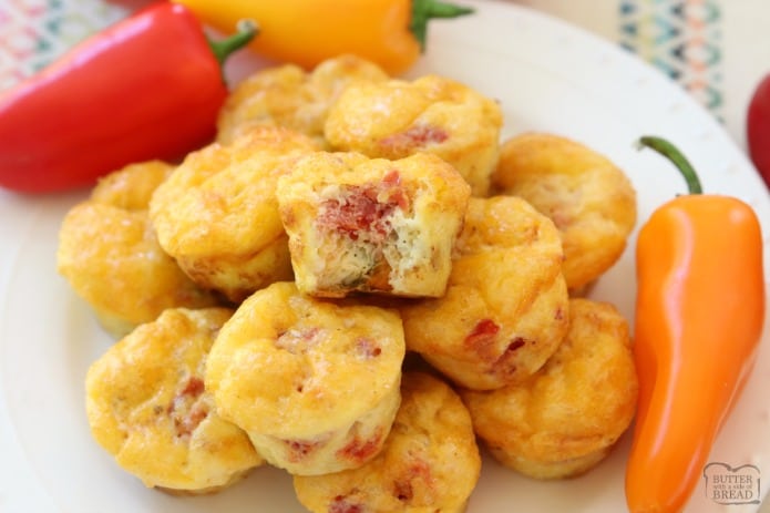 Fiesta Egg Bites are perfect for a hearty & flavorful breakfast, lunch or dinner! Simple recipe made with eggs, tomatoes, cheese and baked into bite-sized portions. Ready in under 30 minutes!