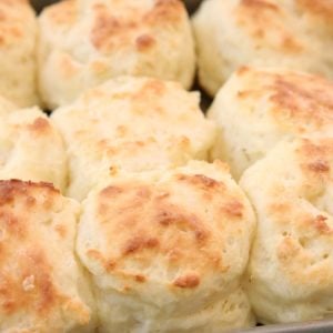 Easy Sour Cream Biscuit Recipe made from scratch in minutes. Perfect soft, flaky texture with fantastic buttery flavor. This will be your new favorite biscuit recipe! Updated with expert advice on how to make the best homemade biscuits.