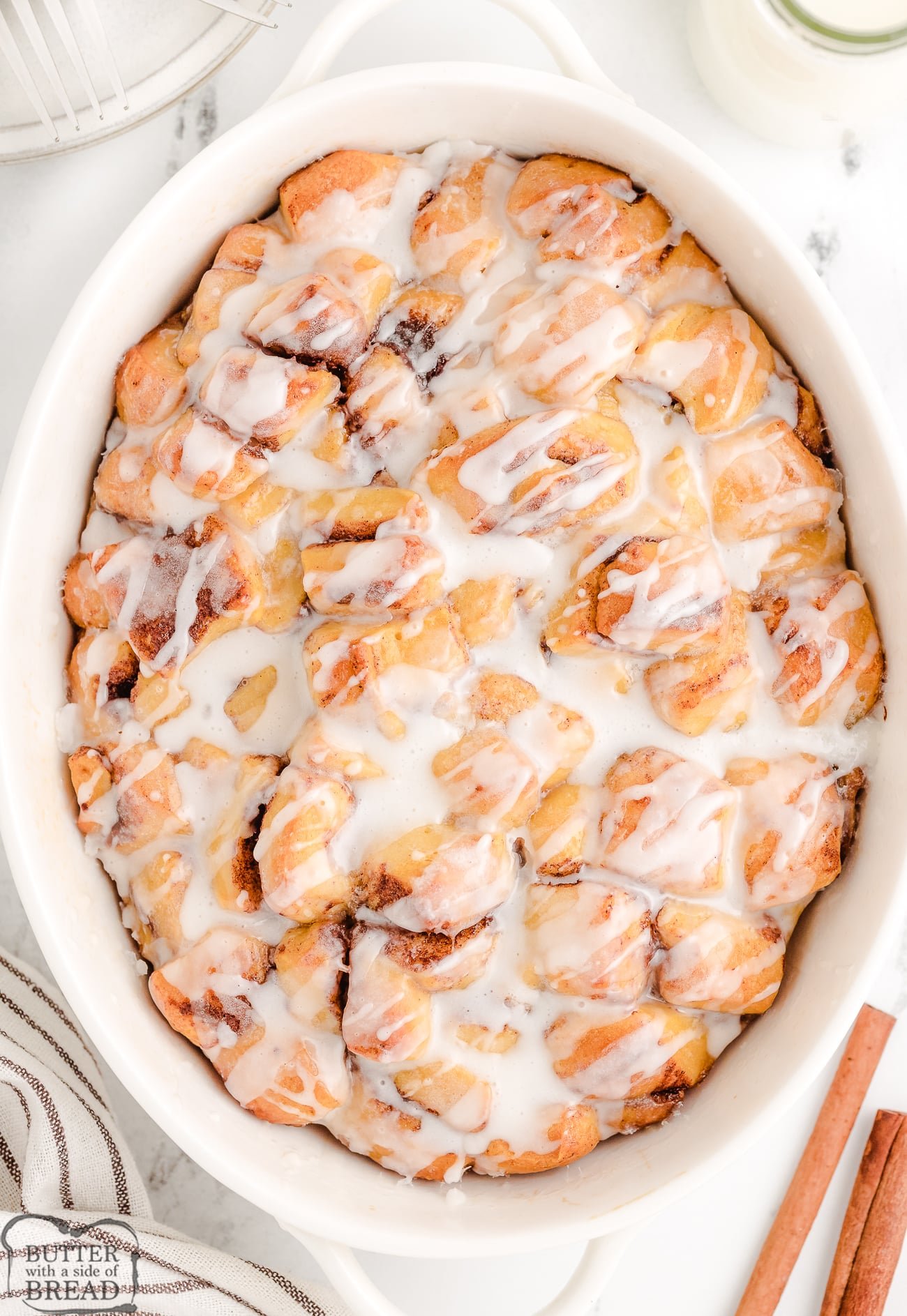 cinnamon roll french toast casserole in a round baking dish