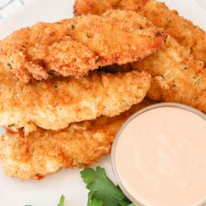 Best Chicken Tenders recipe for tender, juicy & flavorful chicken. Two simple tips to take your chicken strips from good to great! Shows how to make chicken tenders from scratch!