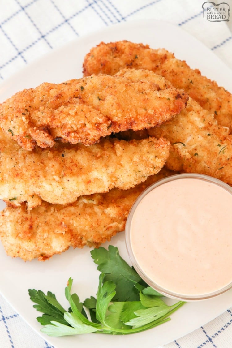 Best Chicken Tenders recipe for tender, juicy & flavorful chicken. Two simple tips to take your chicken strips from good to great! Shows how to make chicken tenders from scratch!