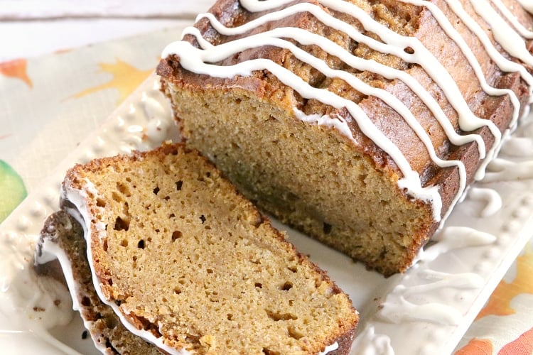 Best Pumpkin Bread that is soft and delicious because it is made with canned pumpkin, vanilla and butterscotch pudding mixes. This pumpkin quick bread recipe is also topped with a delicious cream cheese glaze!