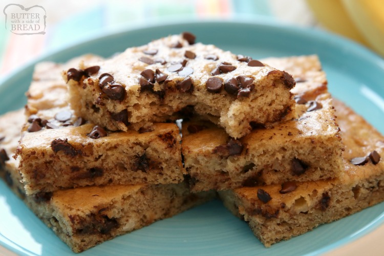 chocolate chip bars with ripe bananas on a blue plate