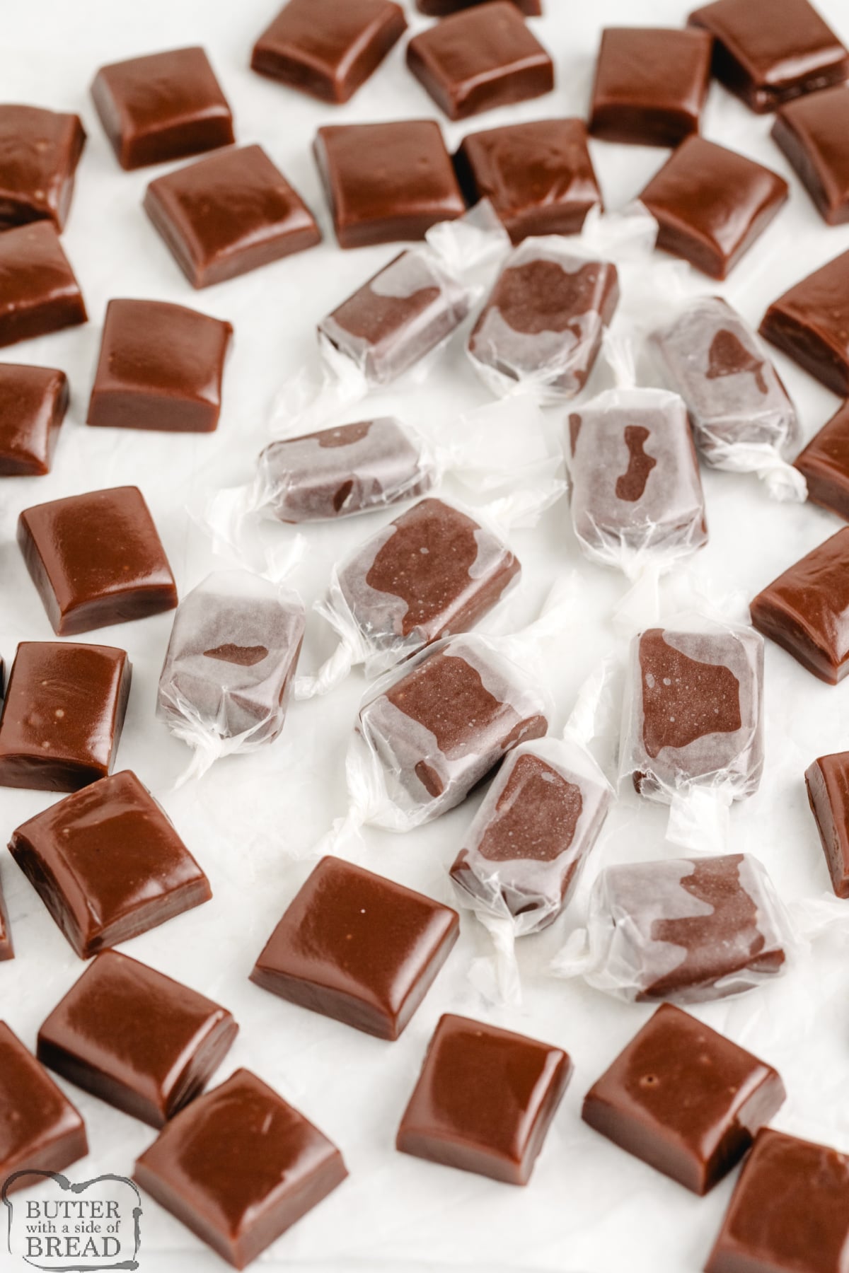 Soft, chewy chocolate caramels cut into bite-size squares and wrapped in wax paper.