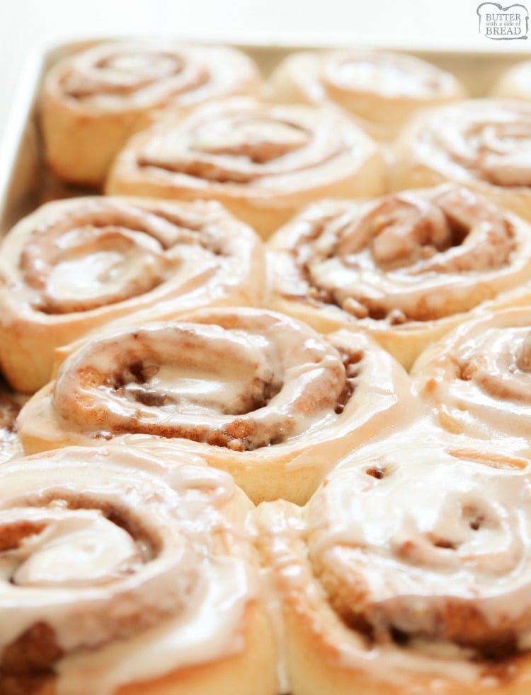 Cinnamon Rolls made from scratch that yield feather-light sweet rolls with pecans, cinnamon and a lovely vanilla glaze. Best cinnamon roll recipe ever!