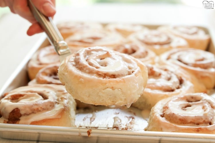 Cinnamon Rolls made from scratch that yield feather-light sweet rolls with pecans, cinnamon and a lovely vanilla glaze. Best cinnamon roll recipe ever!