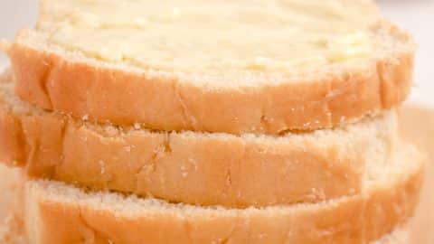 slices of homemade bread on a wooden cutting board