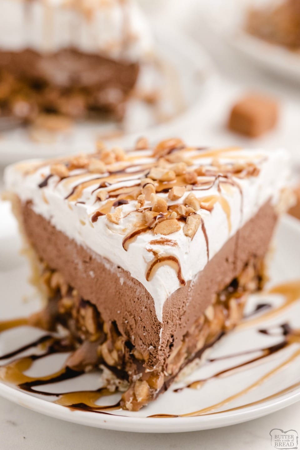 Chocolate Caramel Turtle Pie made with creamy chocolate, salted peanuts and smooth caramel for a delicious 3 layered pie that everyone raves about!