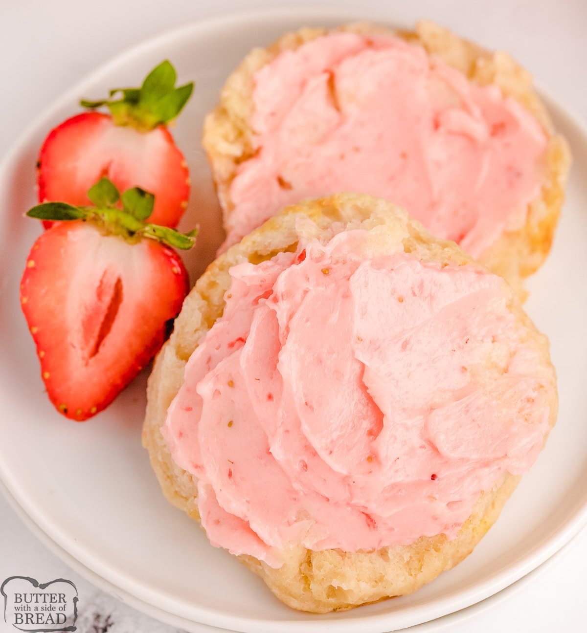 homemade biscuits topped with strawberry butter