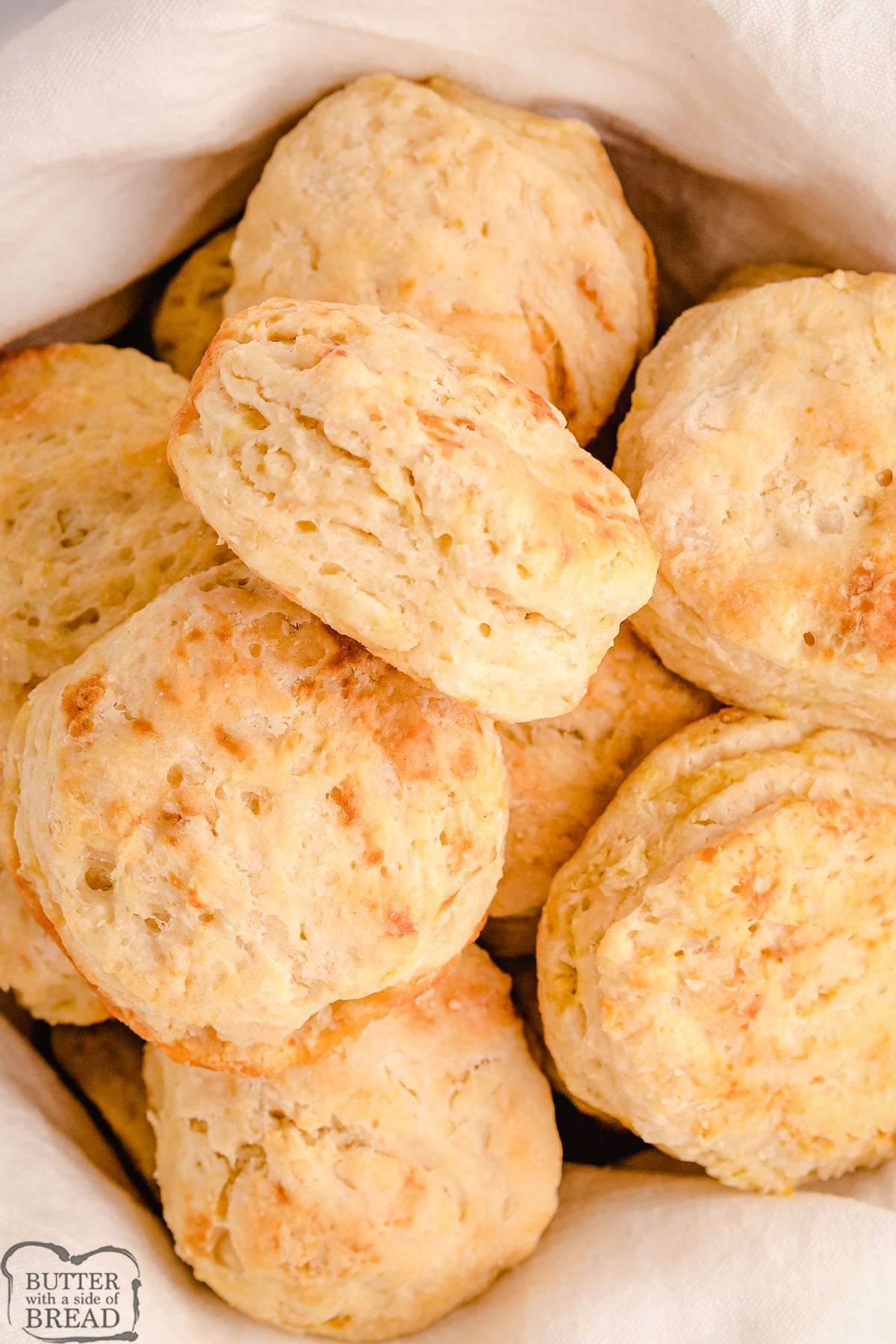 homemade buttery biscuits in a basket