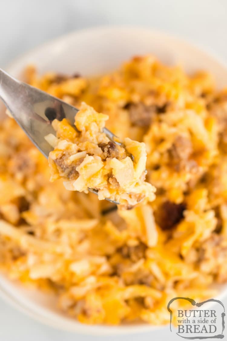 Cheesy Hashbrown Breakfast Casserole is fantastic whether served for breakfast or dinner. It combines cheddar, Swiss and cottage cheese along with hash browns and bacon, sausage or ham! Our favorite breakfast casserole recipe ever!