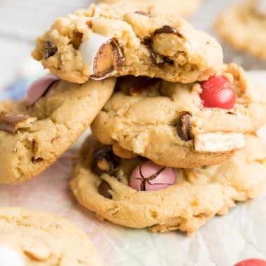 Caramel Pretzel Chocolate Chip Cookies are the ultimate salty sweet combo! Crushed pretzels, Caramel M&M's and semi-sweet chocolate chips all nestled together in buttery cookie dough. Perfect variation on a classic chocolate chip cookie recipe! 
