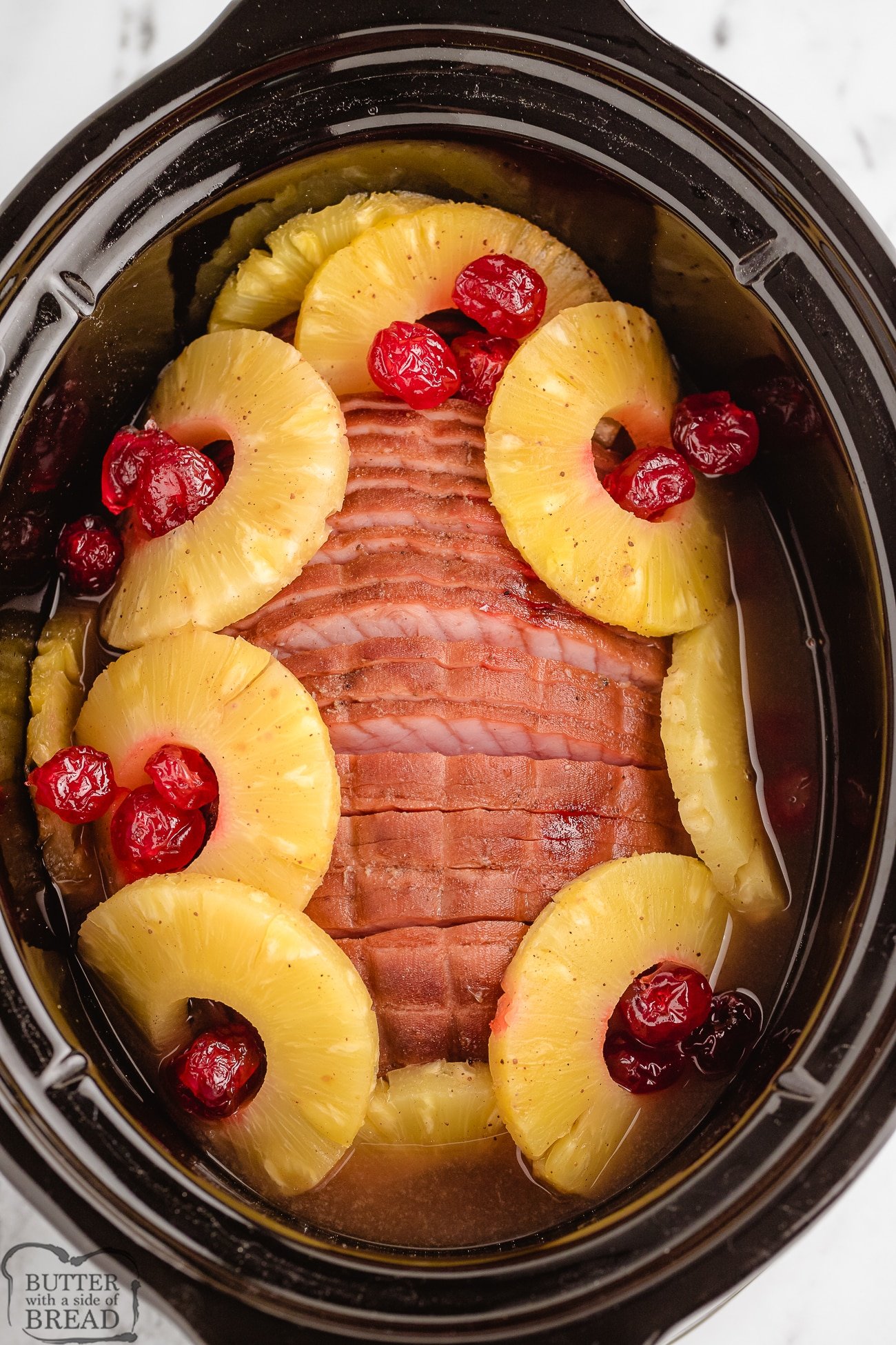 cherries and pineapple in with a sliced ham in the crockpot