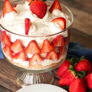 Our Strawberry Trifle recipe is a delicious dessert layered with fresh strawberries, angel food cake and cream cheese whipped cream! Elegant dessert that's made in minutes with very simple ingredients.