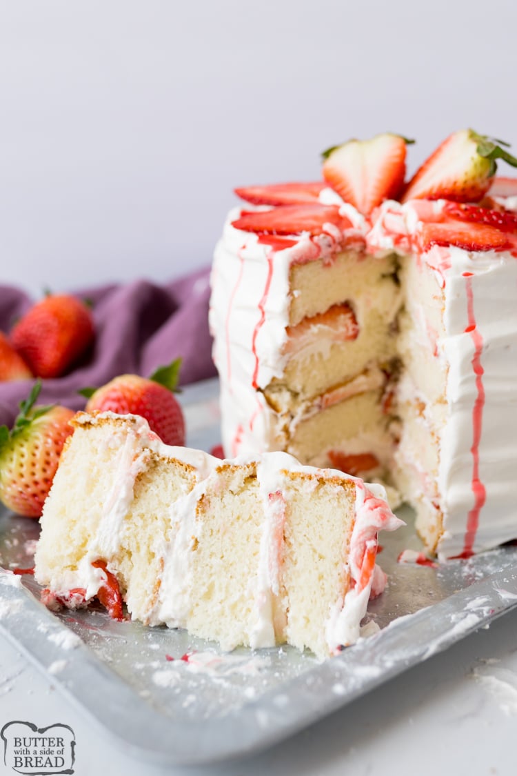 Strawberry Shortcake Cake is a gorgeous vanilla cake filled with whipped vanilla frosting and fresh strawberries. Strawberry Cake made easy with a box cake mix & a spectacular whipped frosting!