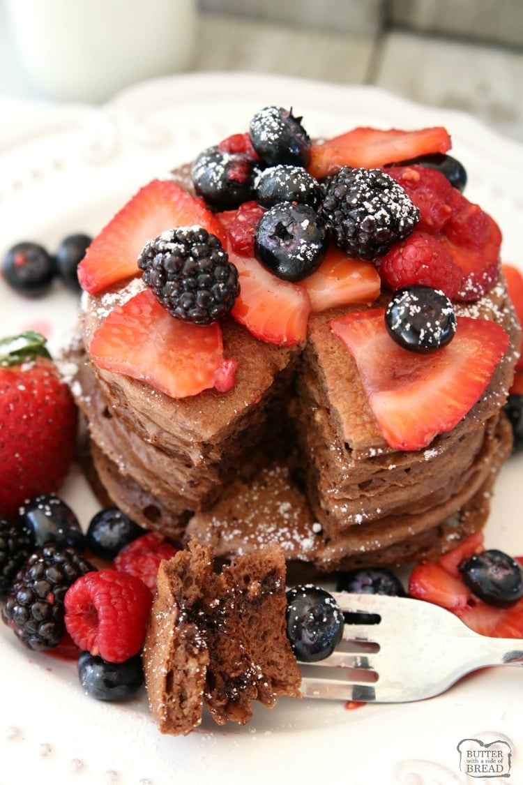 Chocolate Protein Pancakes are sweet protein pancake recipe made with chocolate chips & topped with fresh berries. Perfect for a satisfying breakfast, brunch or dinner!