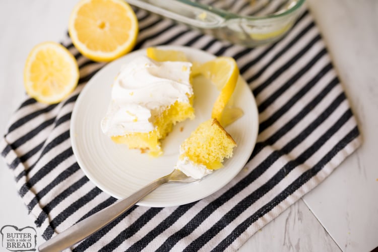 lemon poke cake, plated with lemons