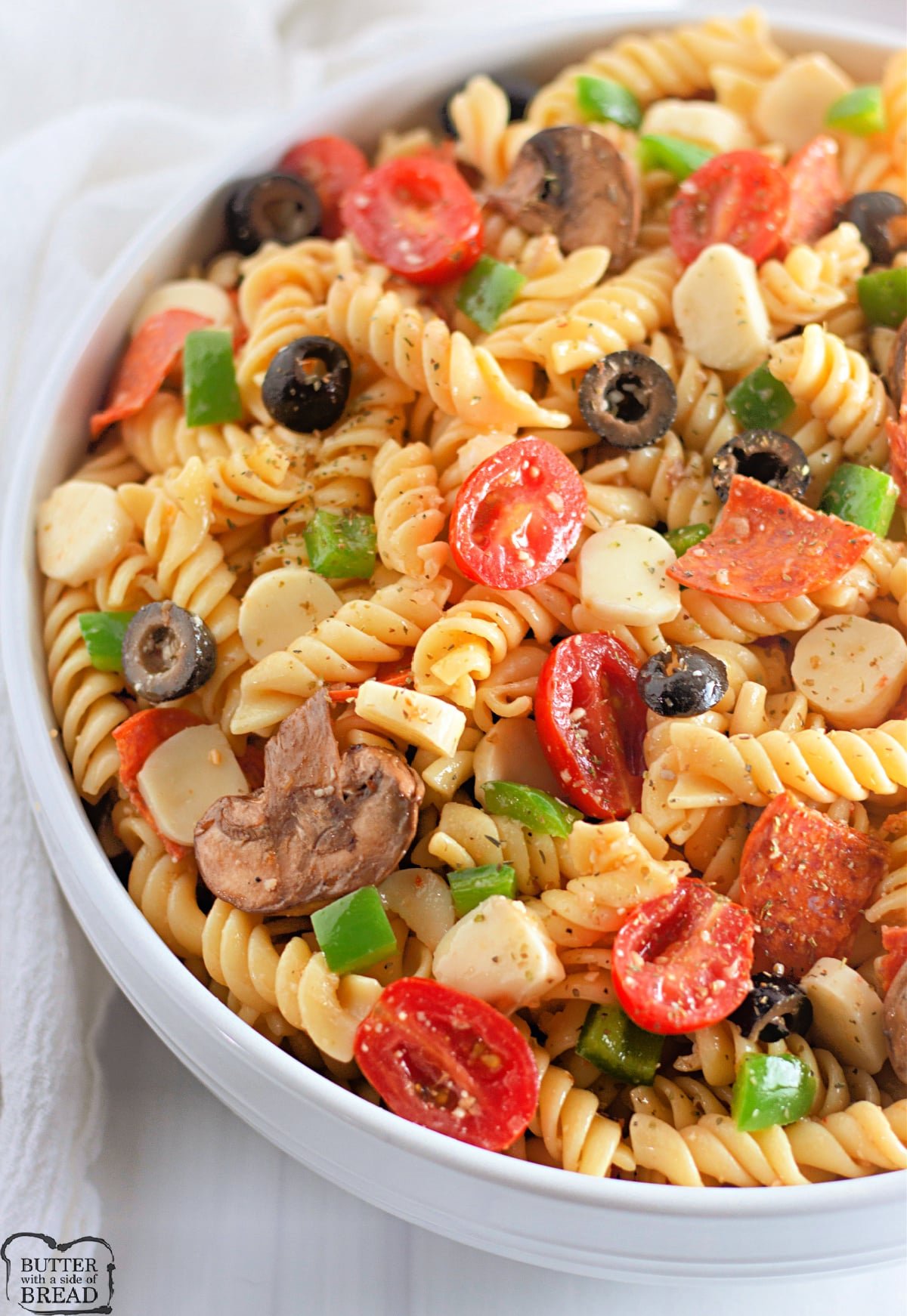 Pasta salad made with Italian dressing and pizza toppings