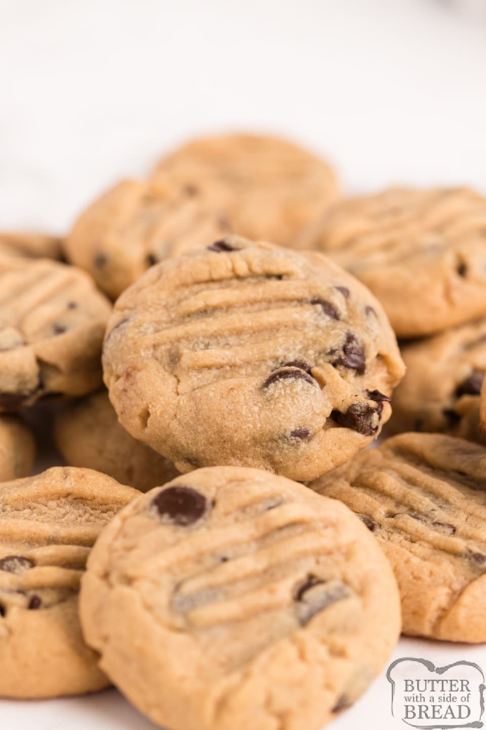 Peanut Butter Chocolate Chip Cookies are soft, chewy, and they turn out perfect every time! Start with an amazing peanut butter cookie recipe and add chocolate chips to take these cookies to the next level!