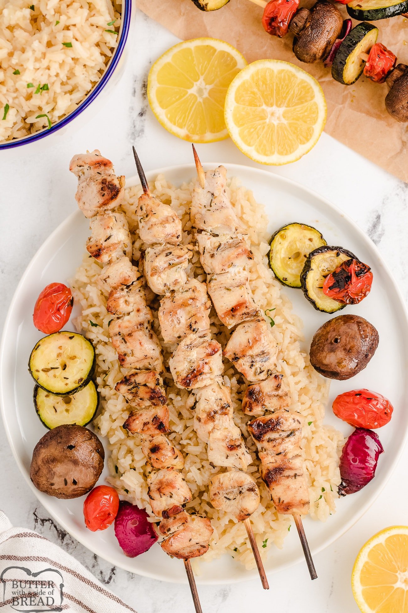 Greek chicken on a skewer, served with lemon rice