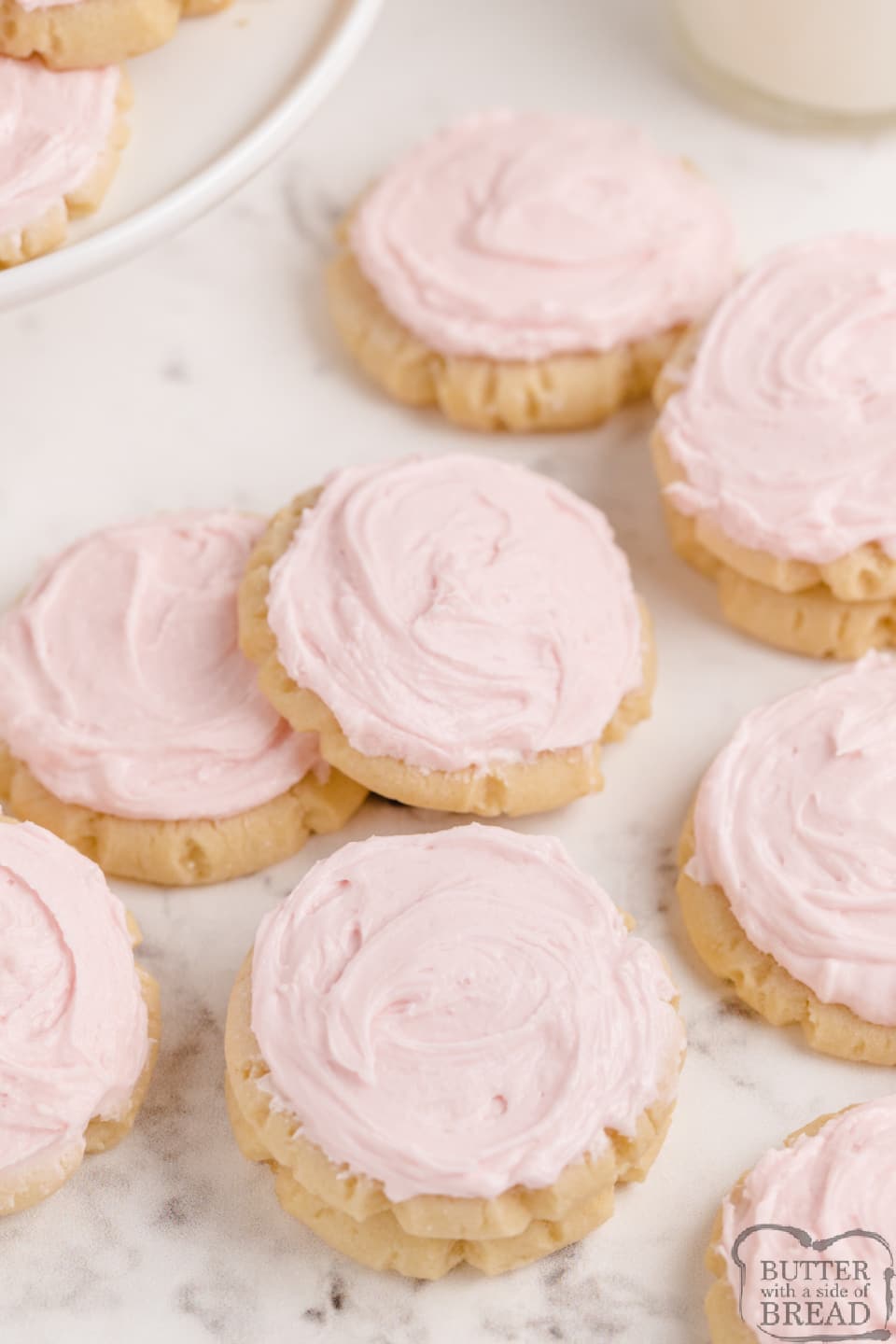 Soft and thick sugar cookies with buttercream frosting
