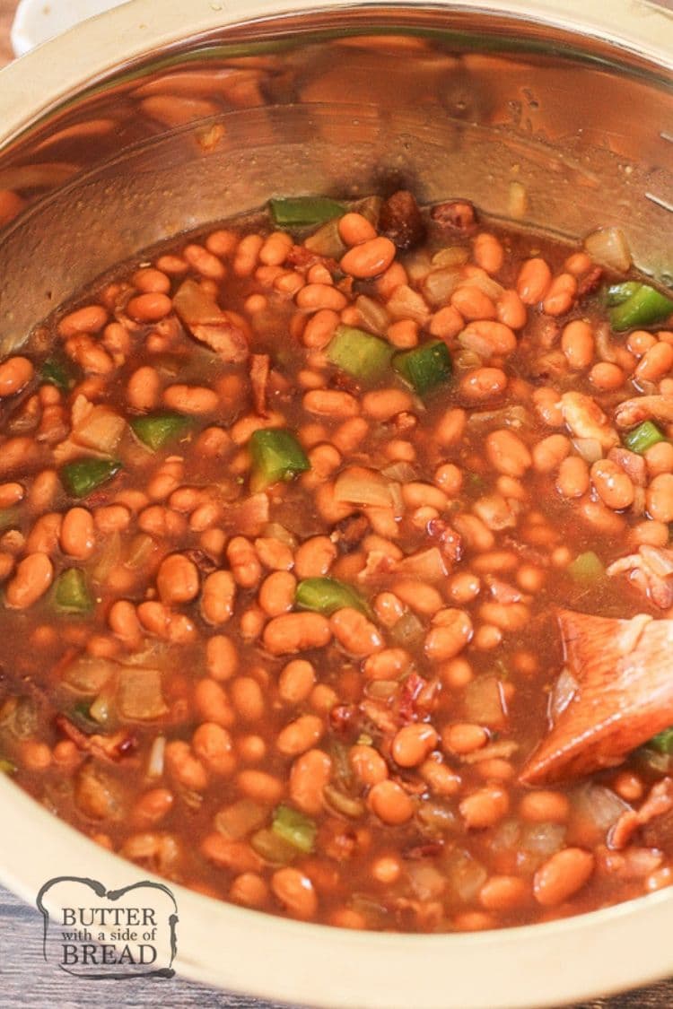 baked beans in a silver mixing bowl