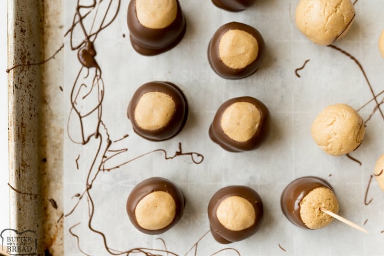 buckeye balls, peanut butter balls being dipped in chocolate
