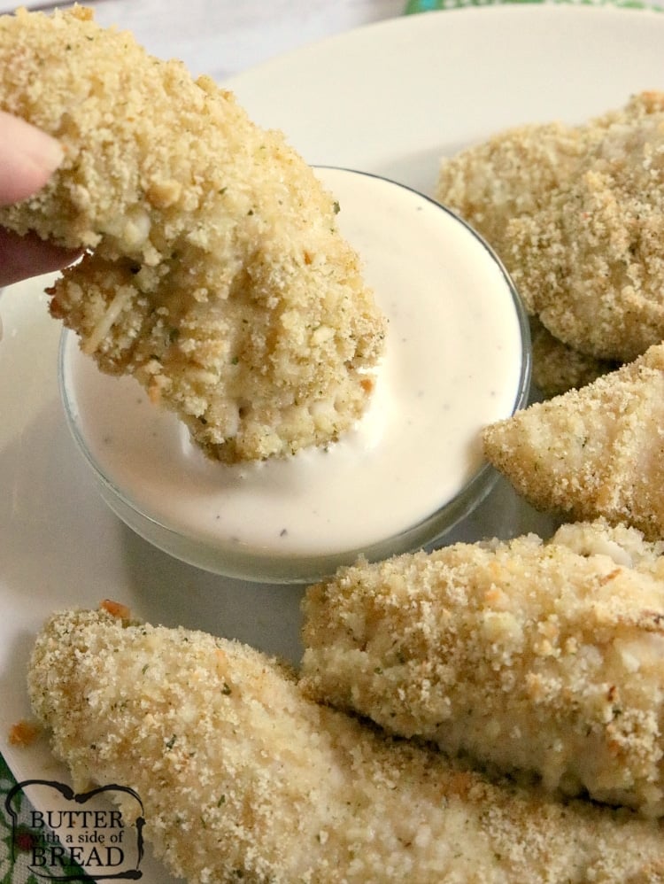 Baked Parmesan Chicken Strips are easily made by coating chicken tenders in a mix of crushed croutons and fresh Parmesan cheese. This baked chicken strip recipe is simple, delicious and a family favorite!