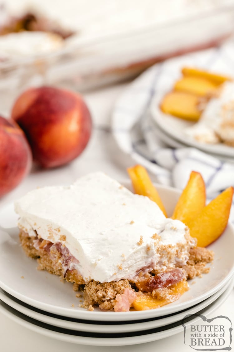 No-Bake Peaches & Cream Bars are one of my favorite fresh peach dessert recipes! Made with peach jello, cream cheese, graham crackers and of course, fresh & juicy peaches!