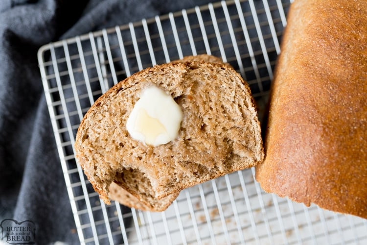 honey wheat bread, sliced with butter and honey