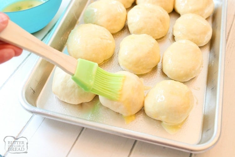 brush homemade rolls with egg wash